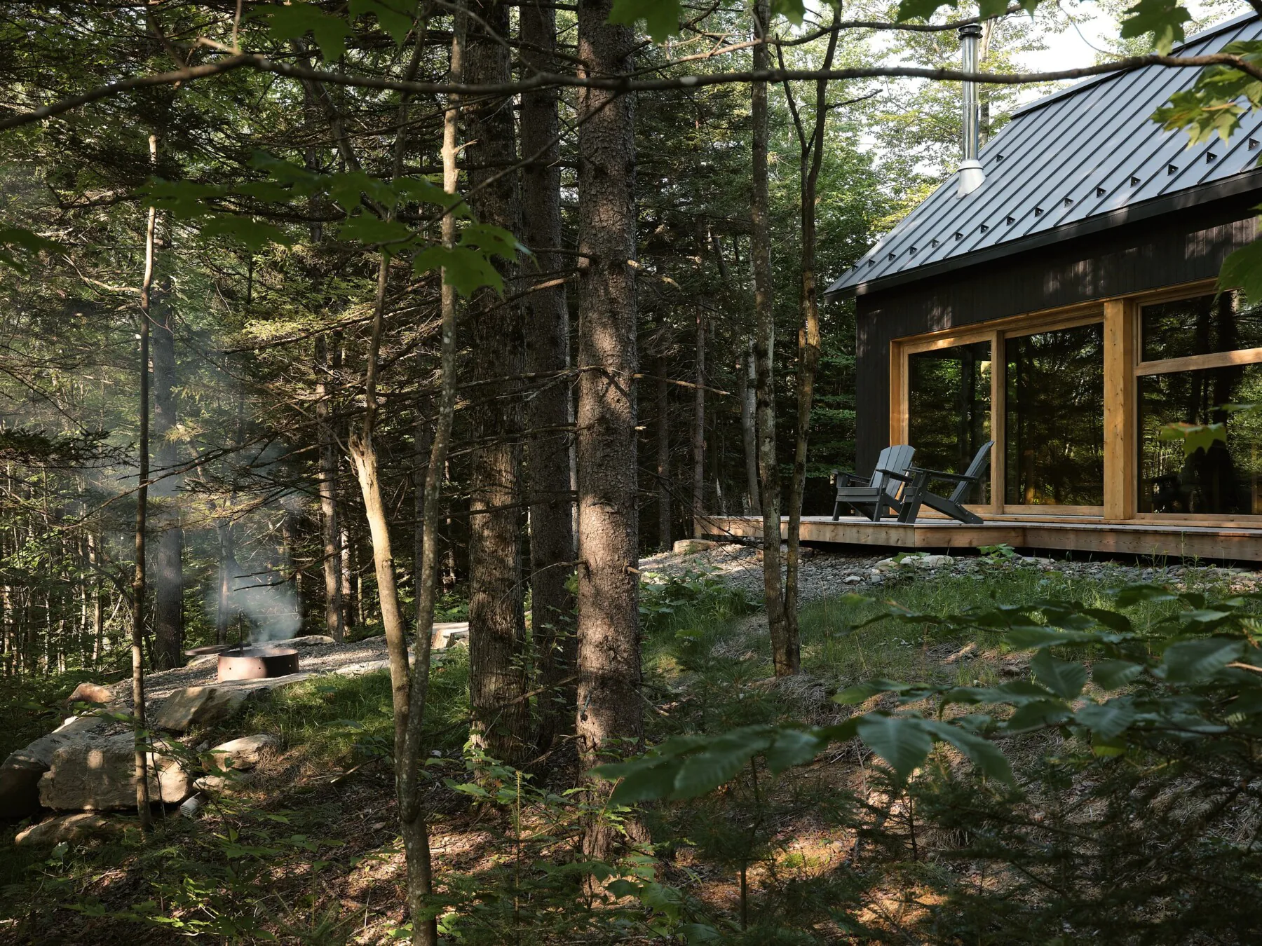 Base Camp, a black-clad house in the forest